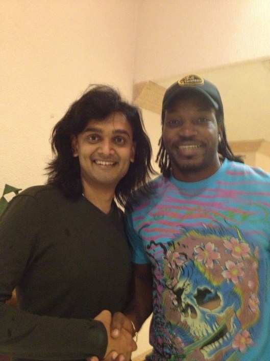Senior International Art of Living teacher Dushyant Savadia with West Indies international cricketer Chris Gayle
